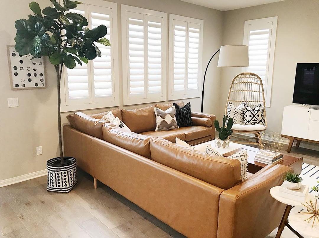 Comfortable living room with our Polywood shutters in Houston.